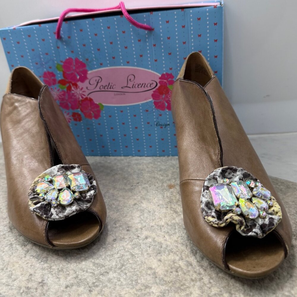 Poetic License London peep toe pumps with rhinestone embellishments. Size 41/10
